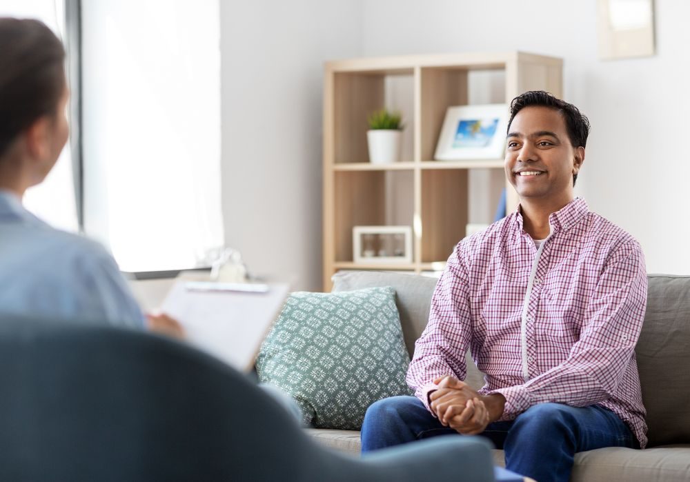 psychologist speaking with a man